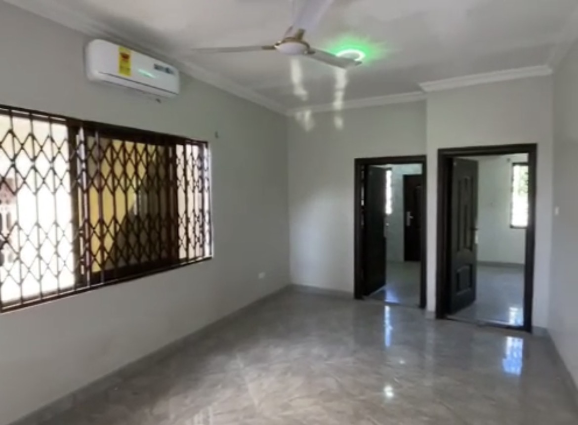 Two bedrooms with three air conditioners.